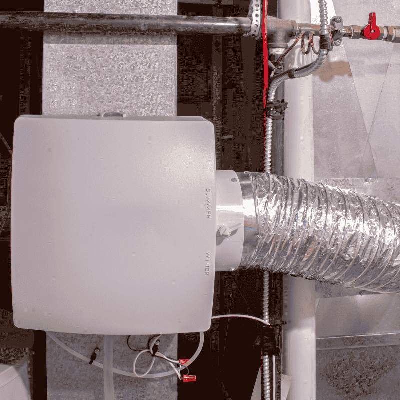 Installing a new humidifier in a residential home in Kitchener - LG Home Comfort