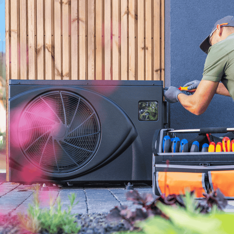 Technician employing advanced diagnostic tools to ensure optimal performance of a heat pump