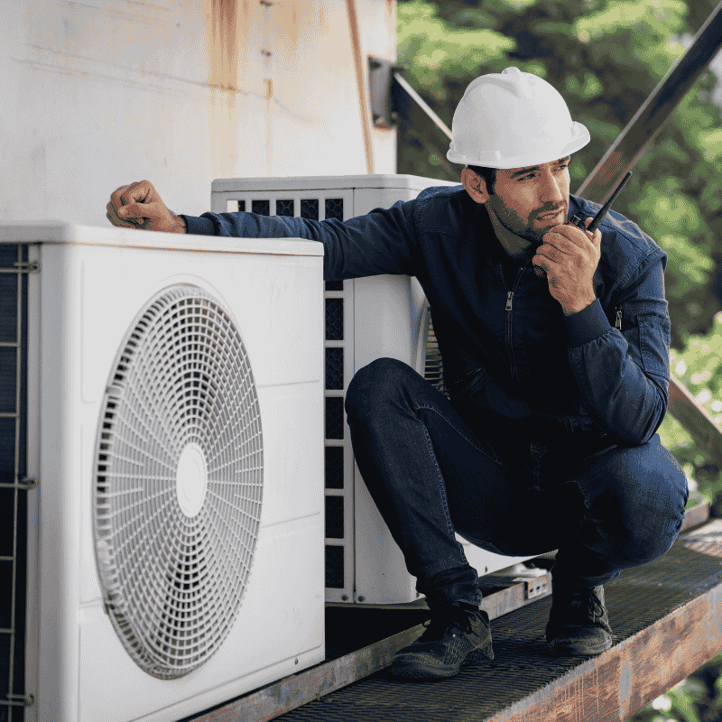Technician performing preventive maintenance on a heat pump system in Scarborough to ensure peak performance and energy efficiency