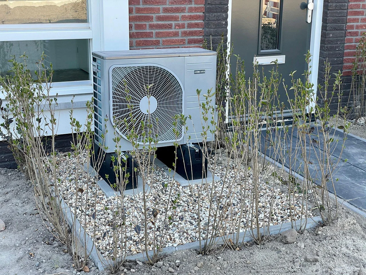A heat pump outside of a house