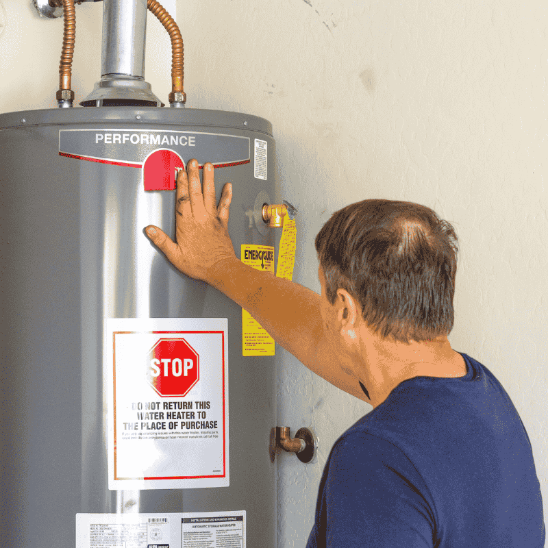 Certified-professional-installing-water-heater-for-optimal-heating-in-Strathroy-ON-LG-Home-Comfort