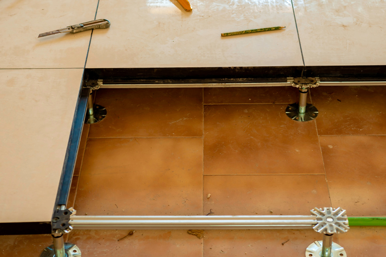Close-up of raised floor installation at a commercial property