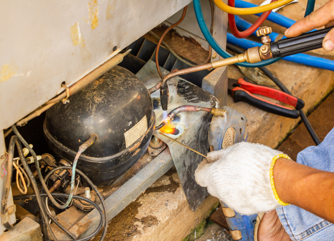 Technician Checking Refrigerant Levels